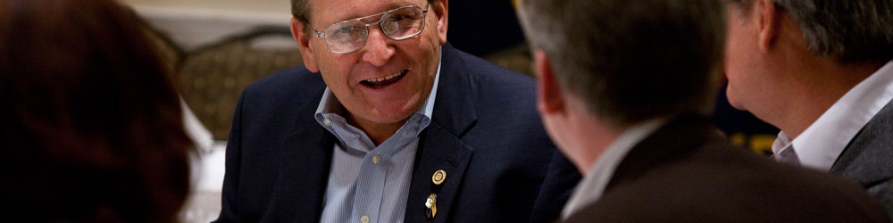 Mark Selkirk chats with fellow Rotarians over lunch at a Wednesday meeting of the Rotary Club of Etobicoke, Ontario, Canada.